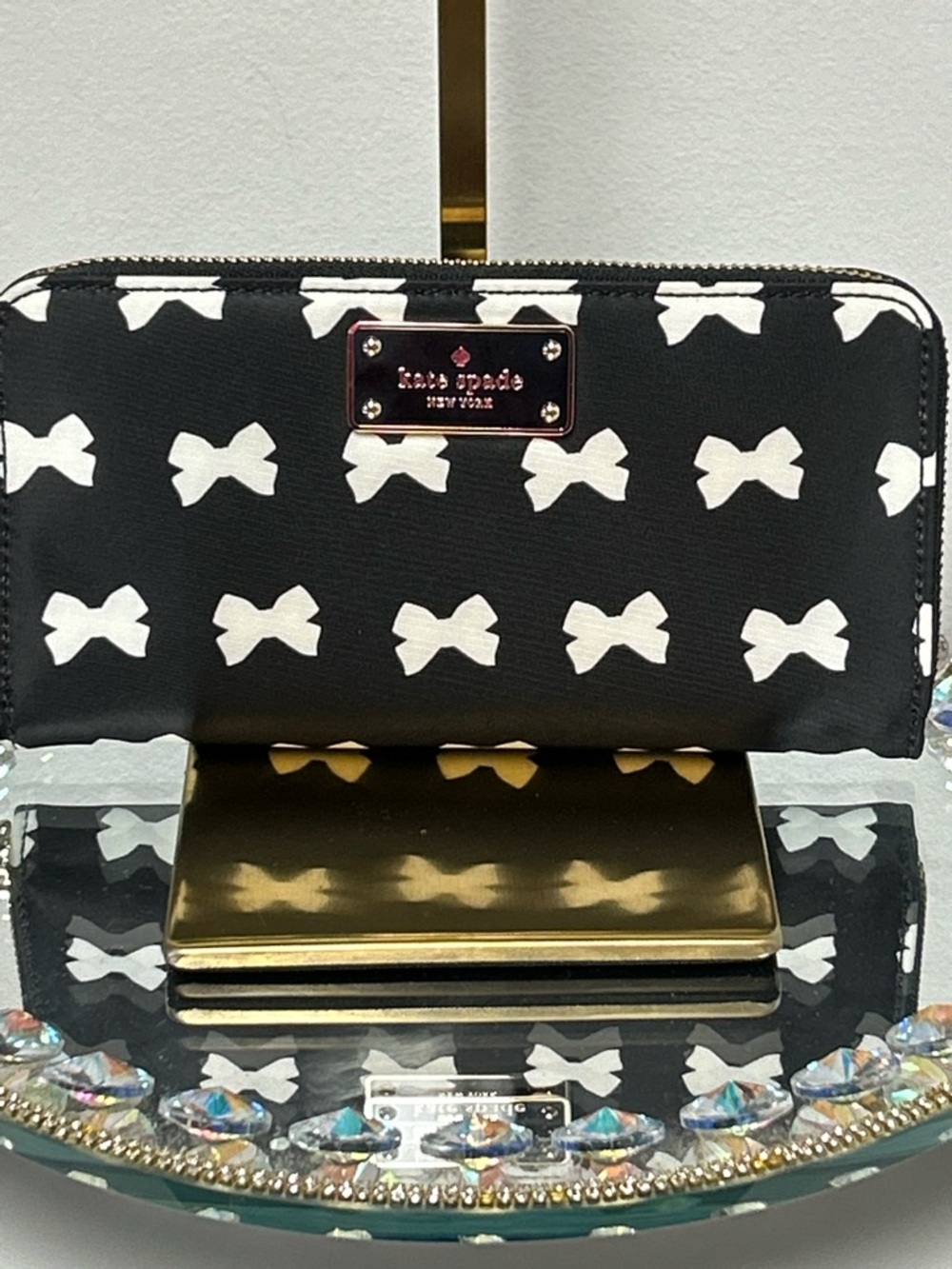 kate spade Black Wallet with White Bow Print and Gold Plaque Approx. 8 x 4